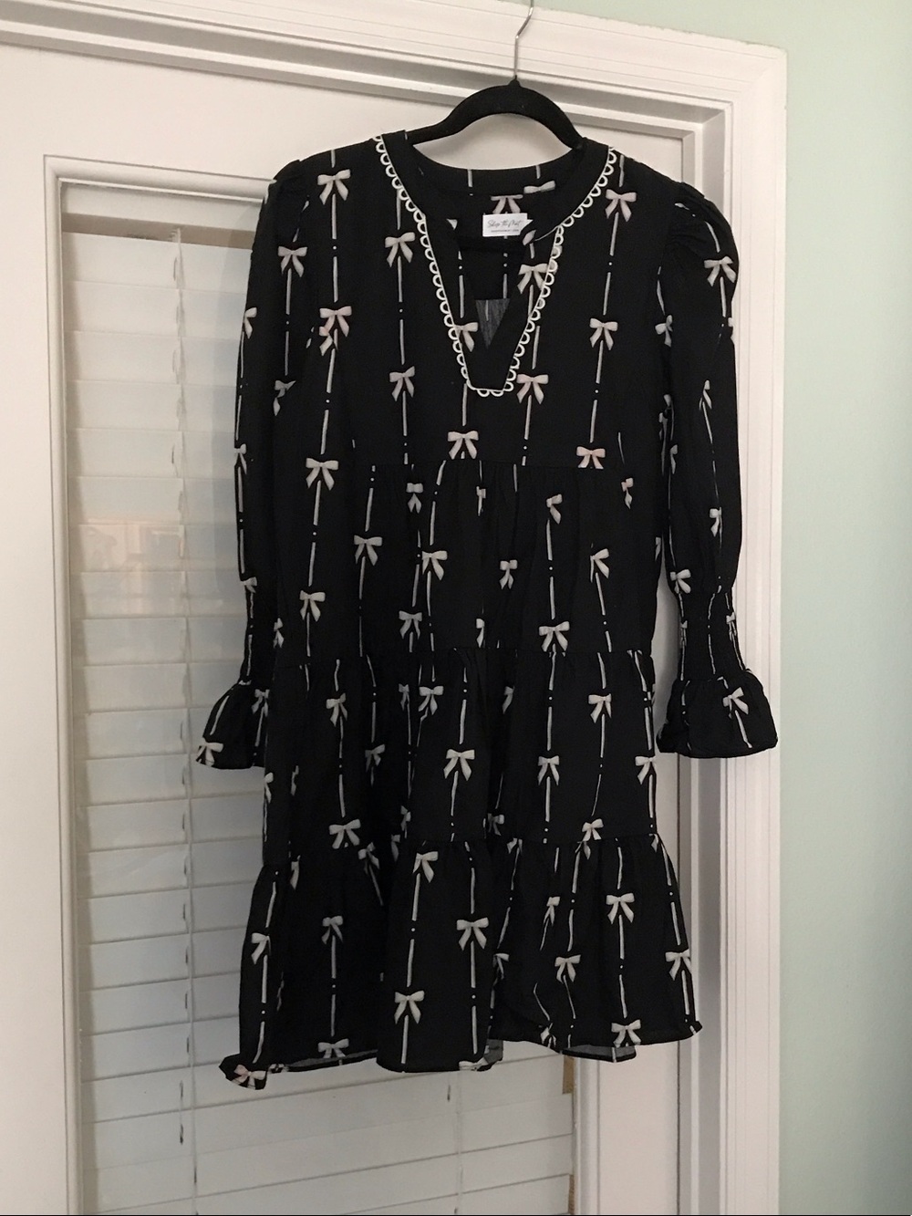 Black Mini Dress with Cream Bow Print